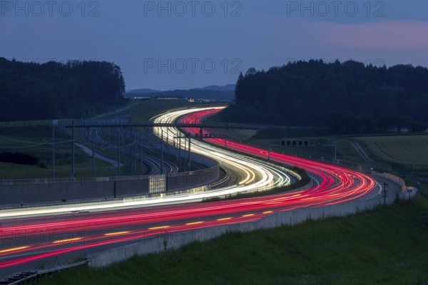Tracers on the A8 motorway, winding road, evening, long exposure, Swabian Alb, Baden-Württemberg,