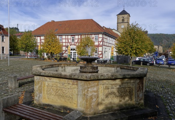 Fountain on the Plan, a cobbled square in the centre of Creuzburg. Creuzburg district, Thuringia,