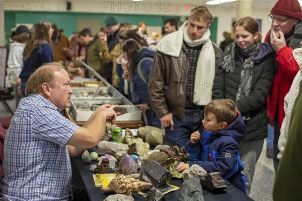 Detroit, Michigan - A teacher explains rocks and minerals to visitors at Wayne State University's