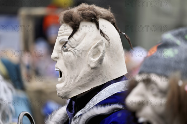Person dressed up as a goth at the Wey guild on Rose Monday, Güdismäntig, Lucerne Carnival 2024,
