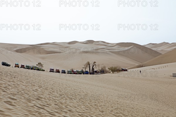 Beach buggies in the dune landscape, Laguna de Huacachina oasis, Ica, Ica region, Ica province,