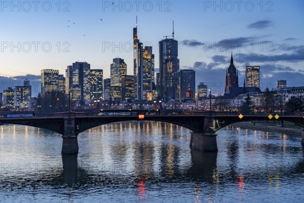 Skyline of the city centre of Frankfurt am Main, river Main, dusk, Ignatz-Bubis-Brücke, Hesse,
