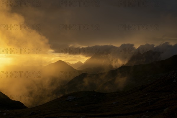 Montafon mountains with dramatic cloudy sky at sunset, Tschagguns, Rätikon, Montafon, Vorarlberg,