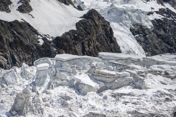 High alpine mountain landscape, glacier ice with crevasses, La Jonction, Chamonix, Haute-Savoie,