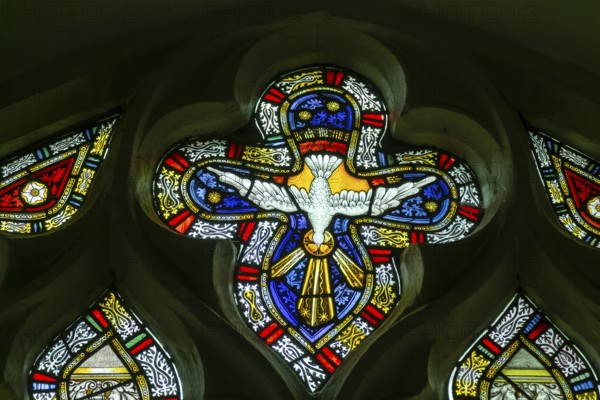 Detail of stained glass window by Charles Eamer Kempe, church of Saint Botolph, Burgh, Suffolk,