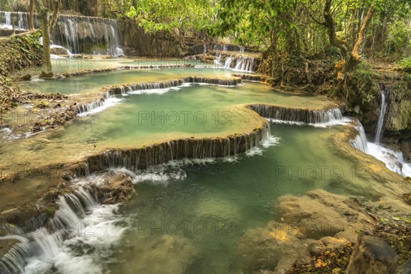 The multi-levelled Kuang Si waterfall near Luang Prabang, Laos, Asia