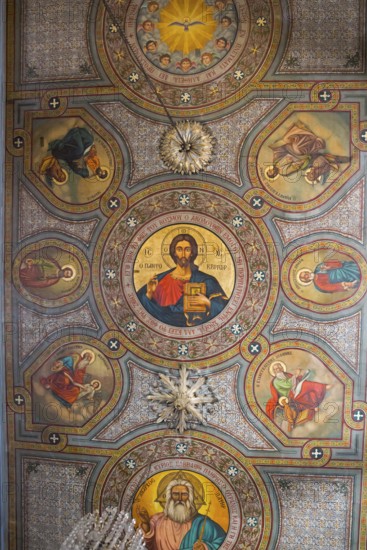 Detailed orthodox fresco on a church ceiling with religious icons and symbolic elements, Panaghia