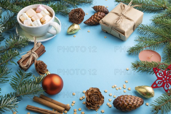 Christmas or New Year frame composition. Decorations, box, cinnamon, cones, fir and spruce
