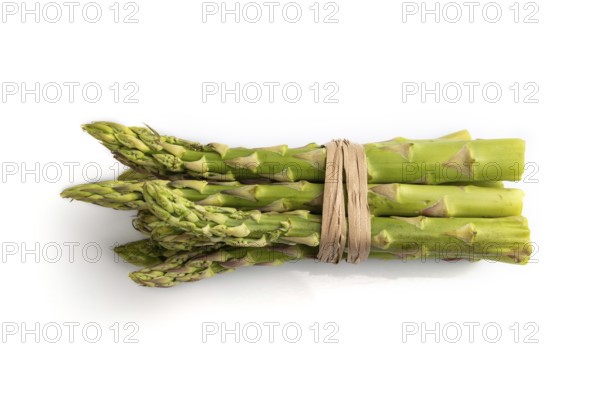 Bunch of fresh green asparagus isolated on white background. Top view, flat lay, close up. harvest,