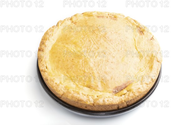 Autumn onion pie and cup of coffee isolated on white background. Side view, close up