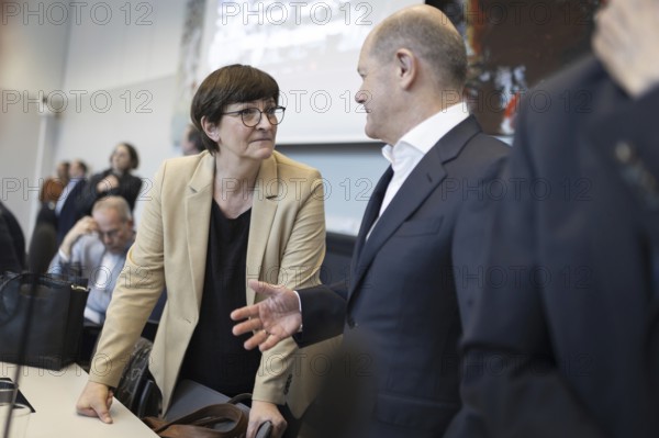 Olaf Scholz (SPD), Federal Chancellor speaks with Saskia Esken, Federal Chairwoman of the SPD,