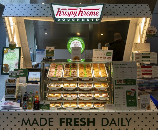Krispy Kreme doughnuts stall in Buttermarket shopping centre, Ipswich, Suffolk, England, UK