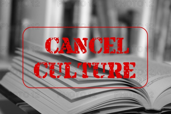 Symbolic image of the debate on the so-called cancel culture with an open book and a large red