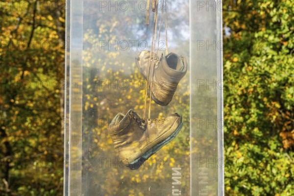 Art installation with hiking boots, artists Walter Gramming and Ushi F, Wiesenburg, International