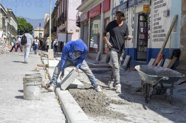 Oaxaca, Mexico, Workers rebuild Carlos Maria Bustamante Street in the center of Oaxaca City. Most