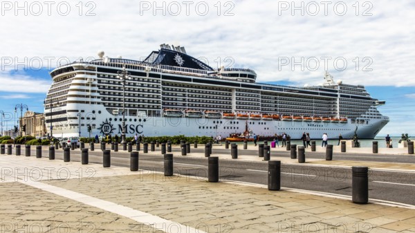 Piazza Unità d'Italia borders directly on the sea with cruise ships, Trieste, harbour city on the