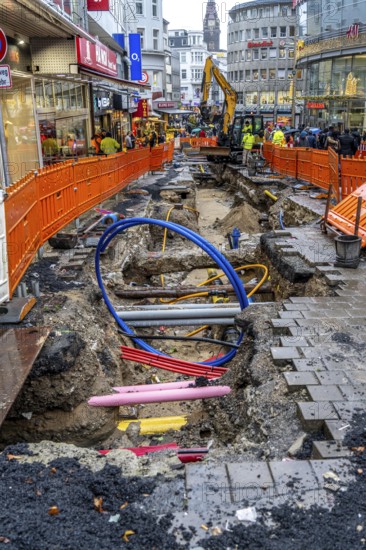 Construction site in the city centre of Wuppertal, laying of new pipelines, various supply lines