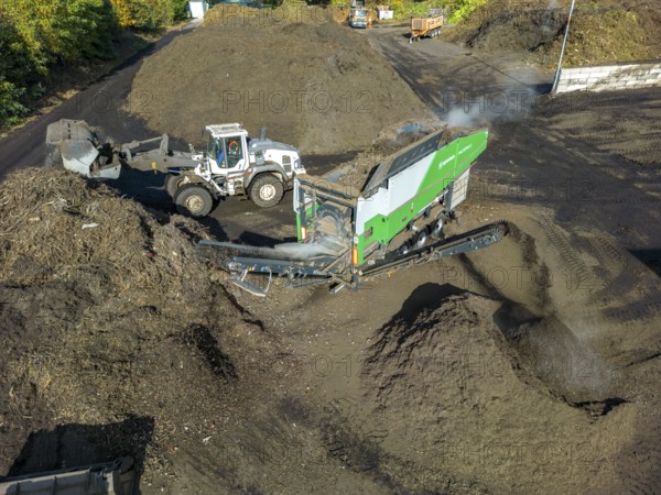 Composting plant, organic waste is composted, sorted by size, smaller parts are reused as compost,