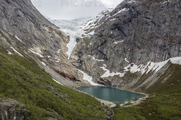 Aerial view of glacier Briksdalsbreen, a glacier tongue of Jostedalsbreen, glacier lake, Norway,
