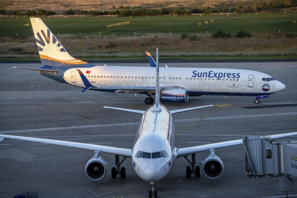 Eurowings Airbus at Terminal 1, C-Gates, Sunexpress Boeing 737 taxiing to the runway, Cologne-Bonn