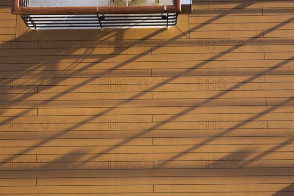 Top view of nonslip wood plank deck with shadow lines on a ship, Souda Port, Crete Island, Greece,