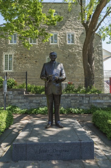 Bronze statue of former Mayor of Montreal Jean Drapeau by Annick Bourgeau installed in Place de la