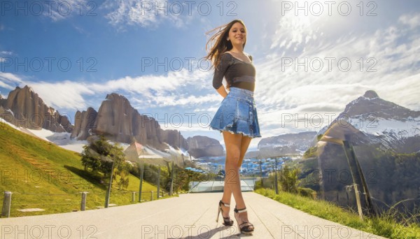 Woman posing on a footpath in a mountain landscape in sunny weather, denim skirt, mini skirt, AI