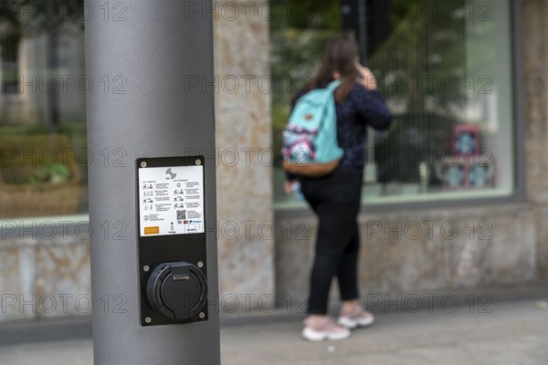 E-charging station in new smart poles, intelligent street lamps, test run, EON and the city of