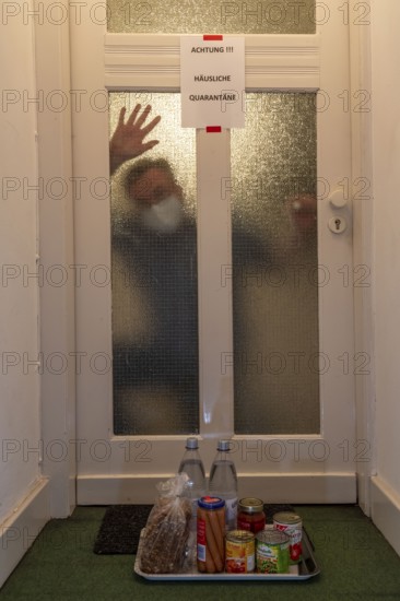 Symbolic image Domestic quarantine, man is in isolation at home due to a suspected corona