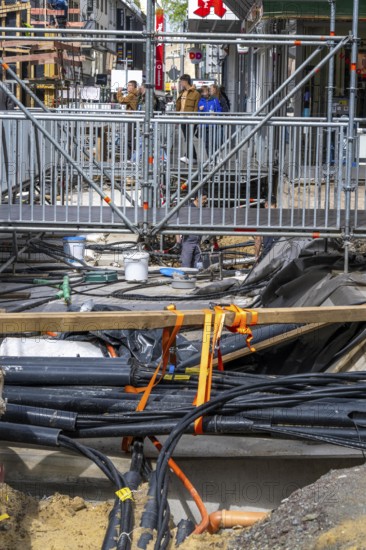 Supply lines, laid underground, exposed during a construction project, Bochum, North