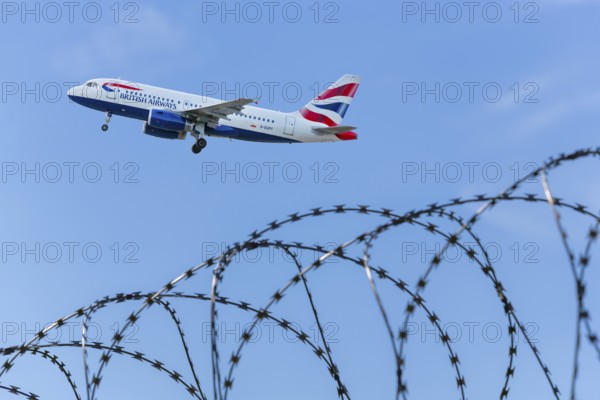 Symbolic image of security, British Airways, security fence, Stuttgart Airport, Baden-Württemberg,