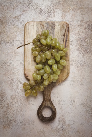 A branch of white grapes, wine grapes, Georgian grape variety Rkatsiteli, top view