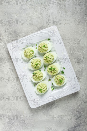 Snack, stuffed eggs with avocado, homemade, no people