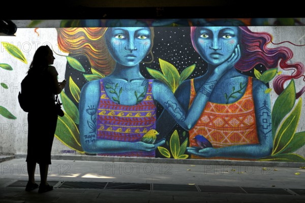 Blue woman, graffiti by Peruvian street artist Bronik, street art in the Baratashvili underground