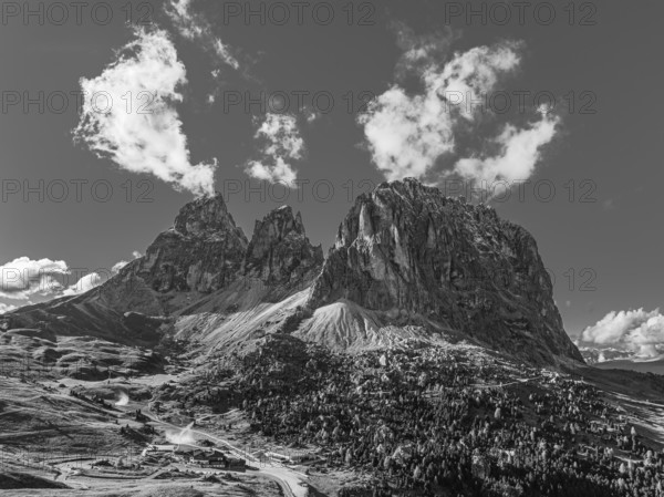 The peaks of the Sassolungo group, Passo Sella, drone shot, black and white photo, Val Gardena,