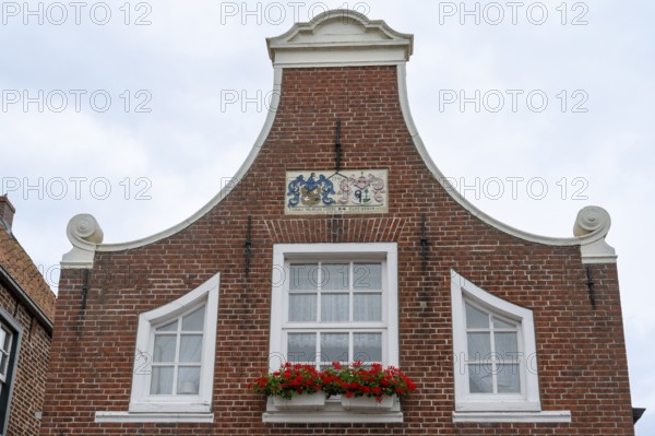 Gable of a brick house, harbour, Greetsiel, East Frisia, Lower Saxony, Germany, Europe