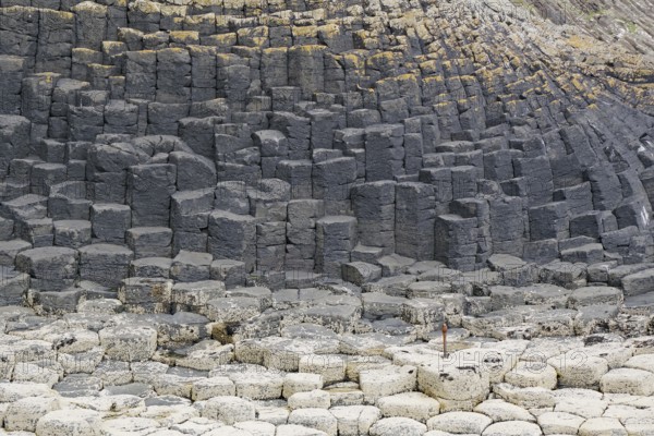Close-up view of hexagonal basalt columns and rocks on the coast, Hebridean Overture, Isle of