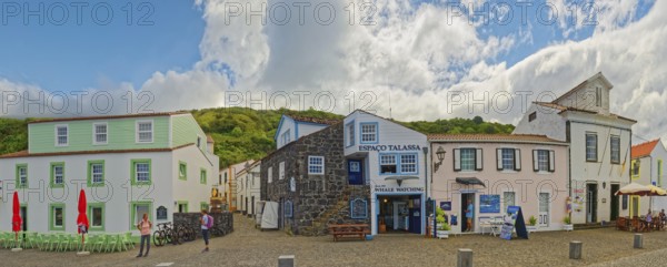 Panoramic view of the whaling and fishing village of Lajes do Pico an empty street with colourful