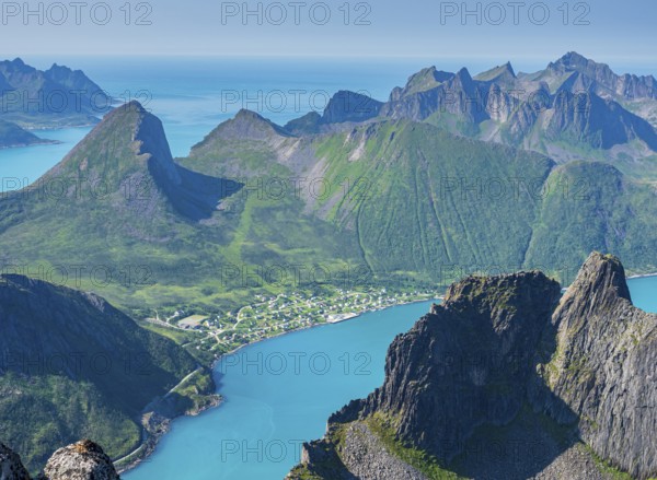 View over fjord Örnfjord, village Fjordgard, peak of Segla (left) and Hesten, seen from mountain