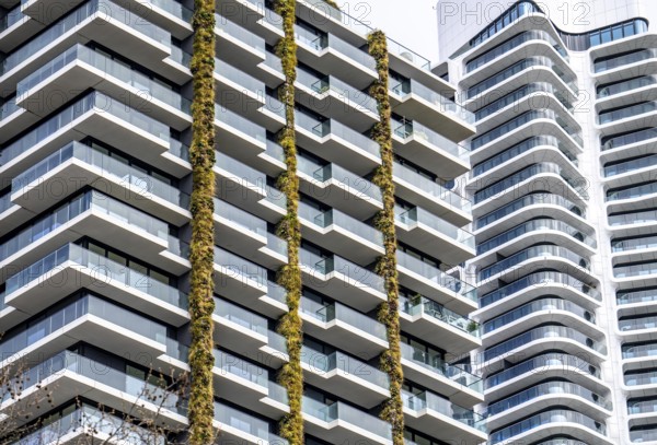 Facade of the Eden Tower on Europa-Allee in Frankfurt am Main, green facade, residential building,