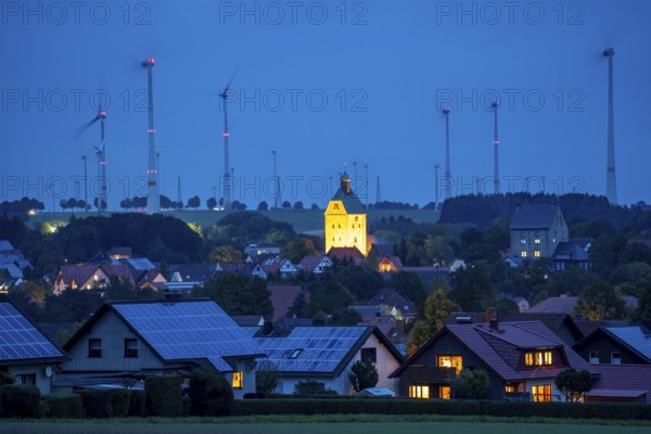 Wind farm above the village of Lichtenau, self-proclaimed energy town, houses with photovoltaic