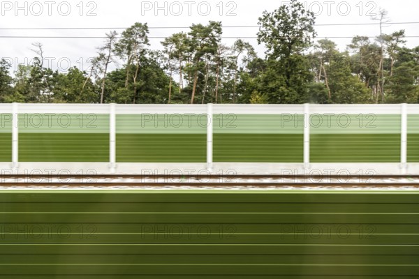 Noise barrier as a contrast to the forest, Nuremberg-Bamberg railway line near Strullendorf, Upper