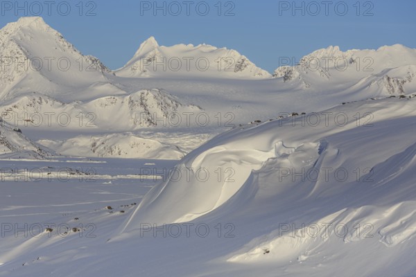 Mountainous winter landscape in the Arctic, sunny, Kulusuk, East Greenland, Greenland, North