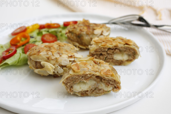 Swabian cuisine, meatballs wrapped in almonds, mixed minced meat, meatballs filled with cheese,