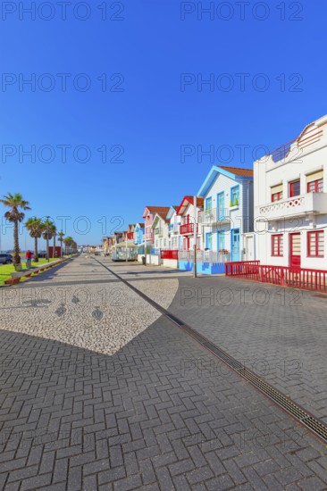 Brightly painted beach homes, Costa Nova do Prado, Aveiro, Portugal, Europe