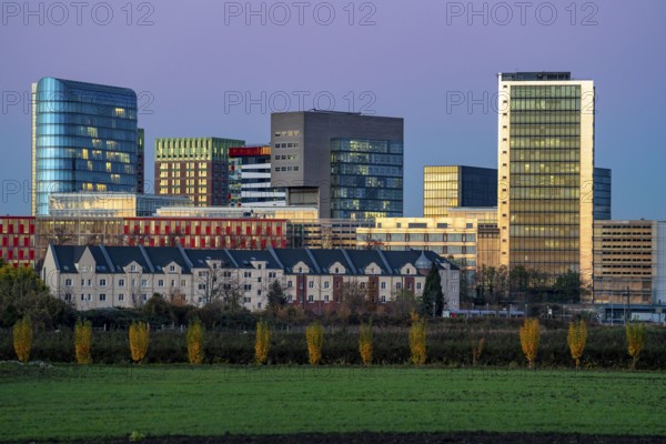 Skyline of the houses in the media harbour, in front of it residential buildings in the Hamm