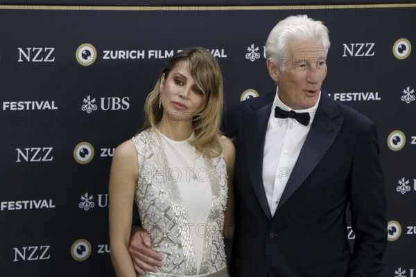 Richard Gere with woman Alejandra Gere at the premiere of Wisdom of Happiness, A heart-to-heart