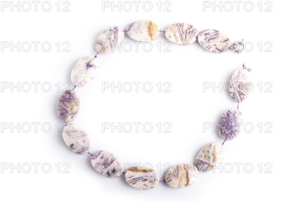 Agate colored beads isolated on white background. top view, close up