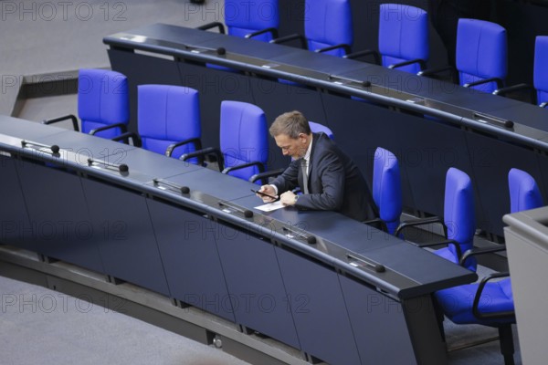 Christian Lindner (FDP), Federal Minister of Finance, sits on the government bench in the Bundestag