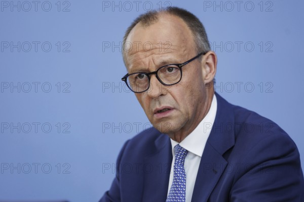 Friedrich Merz, CDU party chairman, at the Federal Press Conference on the consequences of Solingen